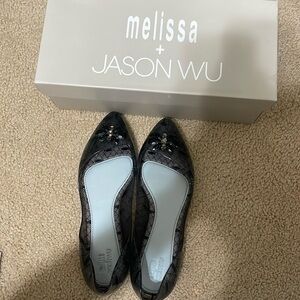 Melissa x Jason Wu Ballet Flats. Size 8 color Black the shoes are clear.